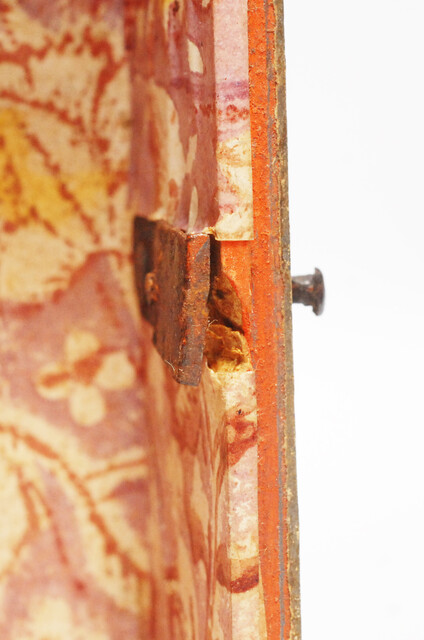 An Seventeenth Century small box decorated with flower leaves and a stylized butterfly.
