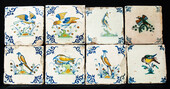 Eight very rare early 17th C Delft coloured tiles with birds.