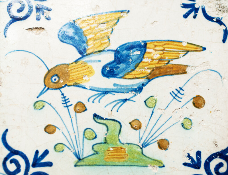 Eight very rare early 17th C Delft coloured tiles with birds.