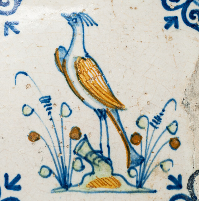 Eight very rare early 17th C Delft coloured tiles with birds.
