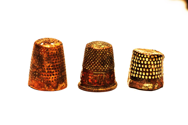 Fifteen Dutch thimbles all from an early seventeenth excavation site in Amsterdam.