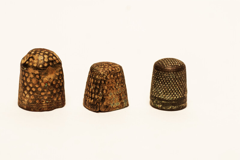 Fifteen Dutch thimbles all from an early seventeenth excavation site in Amsterdam.