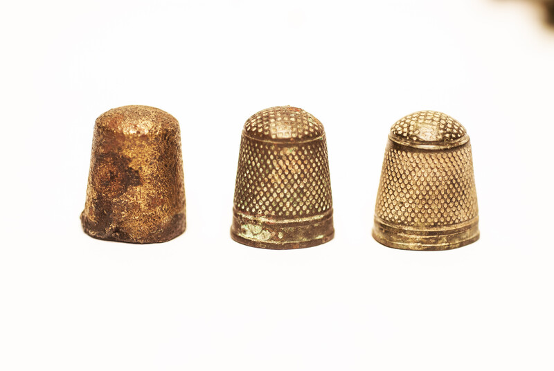 Fifteen Dutch thimbles all from an early seventeenth excavation site in Amsterdam.