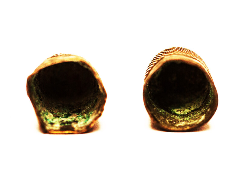 Fifteen Dutch thimbles all from an early seventeenth excavation site in Amsterdam.