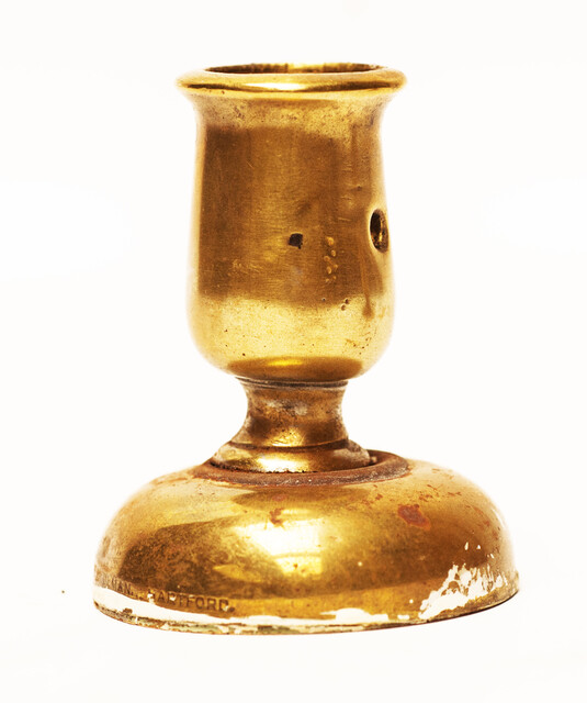 Three attractive brass 19th century small composed candle sticks.