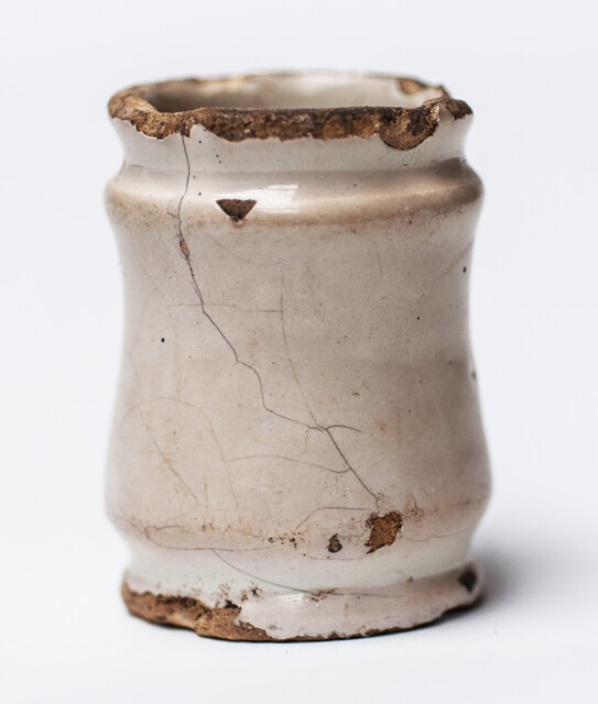 Three Delft white 17th C. albarello ointment jars.