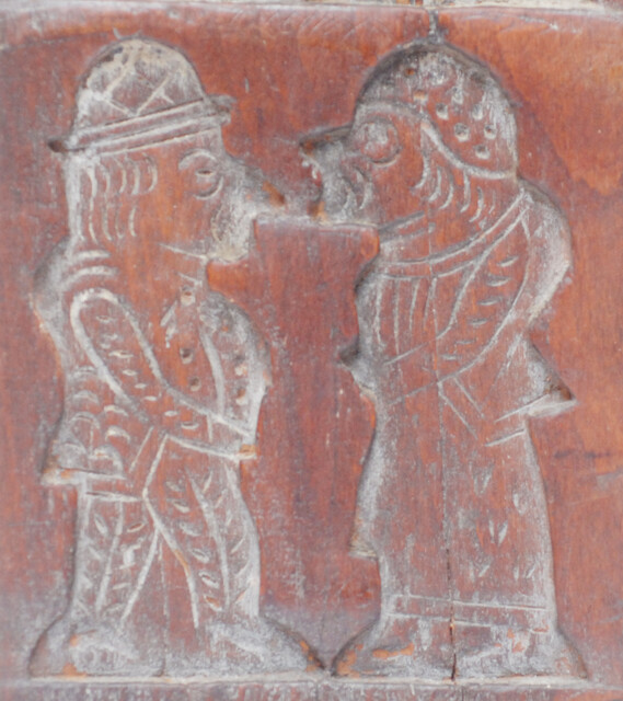 Two Dutch wooden cooky moulds, one of which with Saint Nicholas.