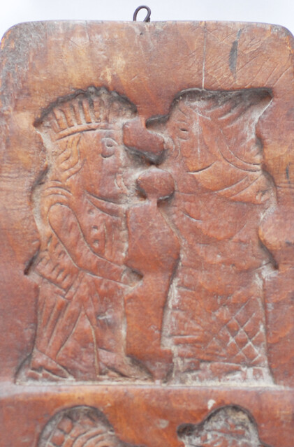 Two Dutch wooden cooky moulds, one of which with Saint Nicholas.