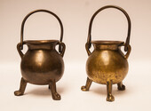 Two early 18th century heavy bronze cauldrons.