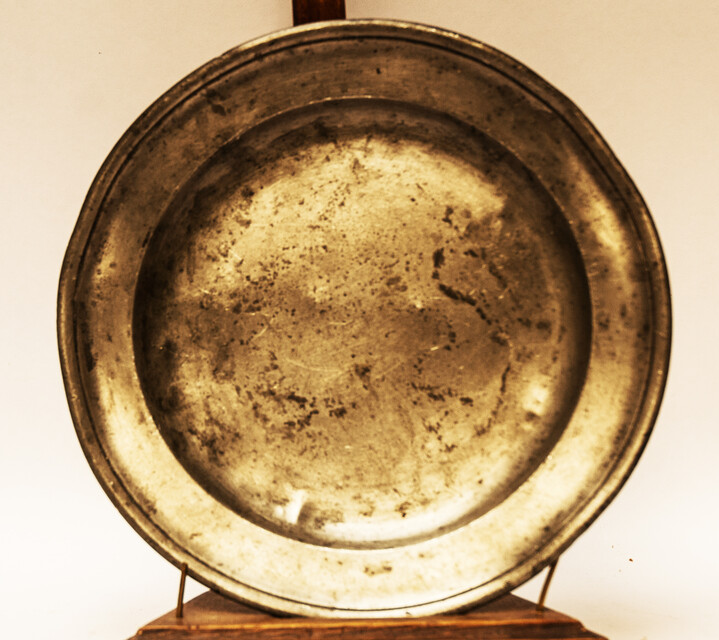 Two eighteenth century pewter plates in mint condition.