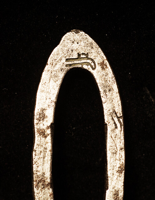 Two flint irons with a blacksmiths touch mark of a pistol.