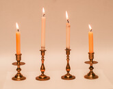 Two pair of brass nineteenth century travelling candle sticks.