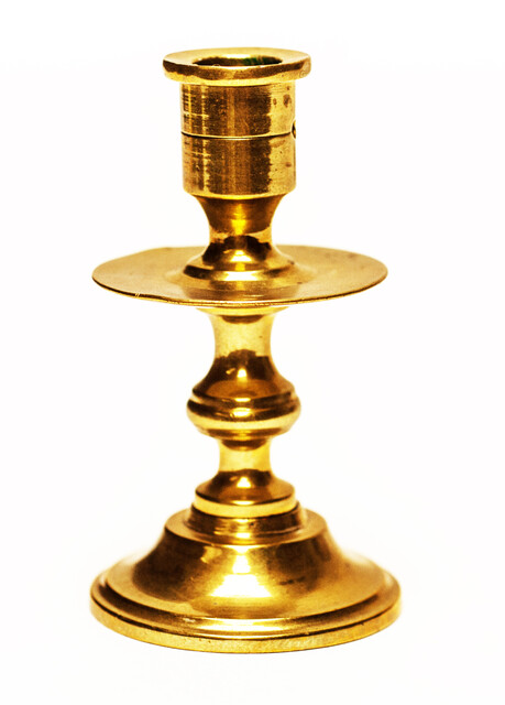 Two pair of brass nineteenth century travelling candle sticks.