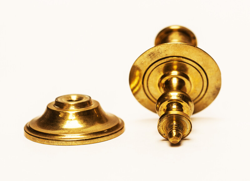 Two pair of brass nineteenth century travelling candle sticks.