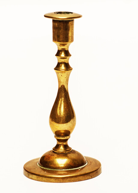 Two pair of brass nineteenth century travelling candle sticks.