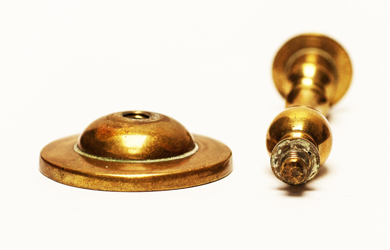 Two pair of brass nineteenth century travelling candle sticks.
